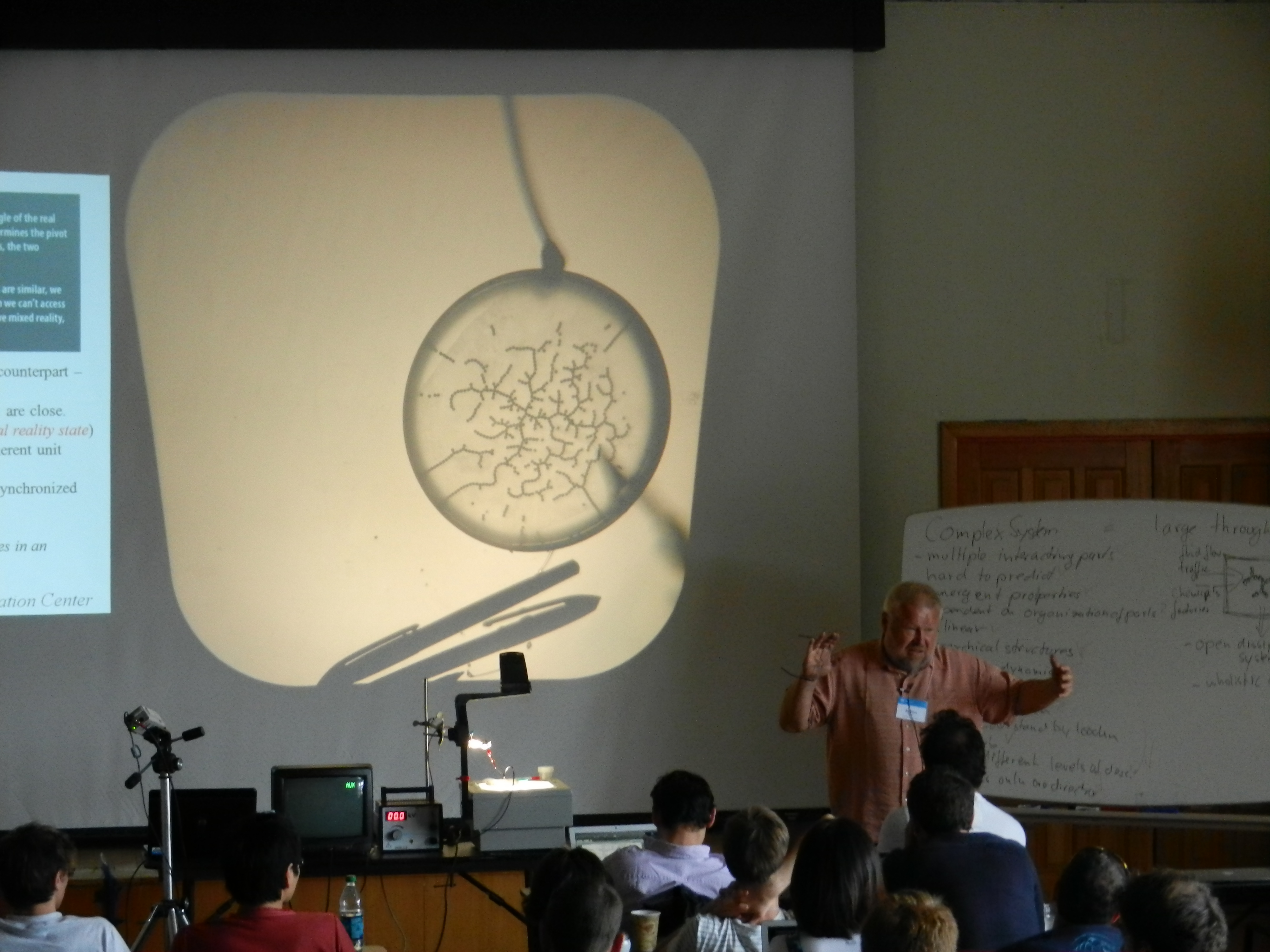 Alfred Hübler demonstrates how fractal self-organization arises when electricity is passed through metal ball bearings.